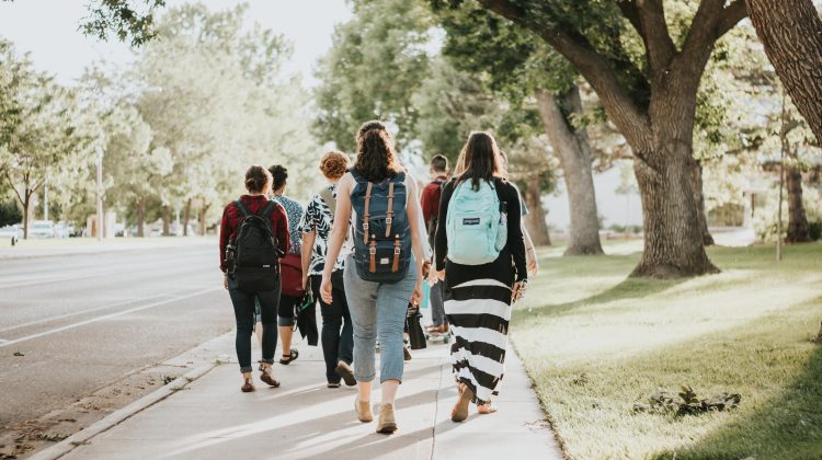 college students walking